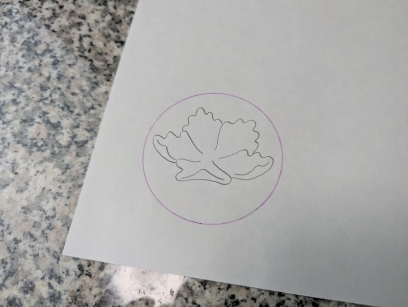 円の中心に花を描く